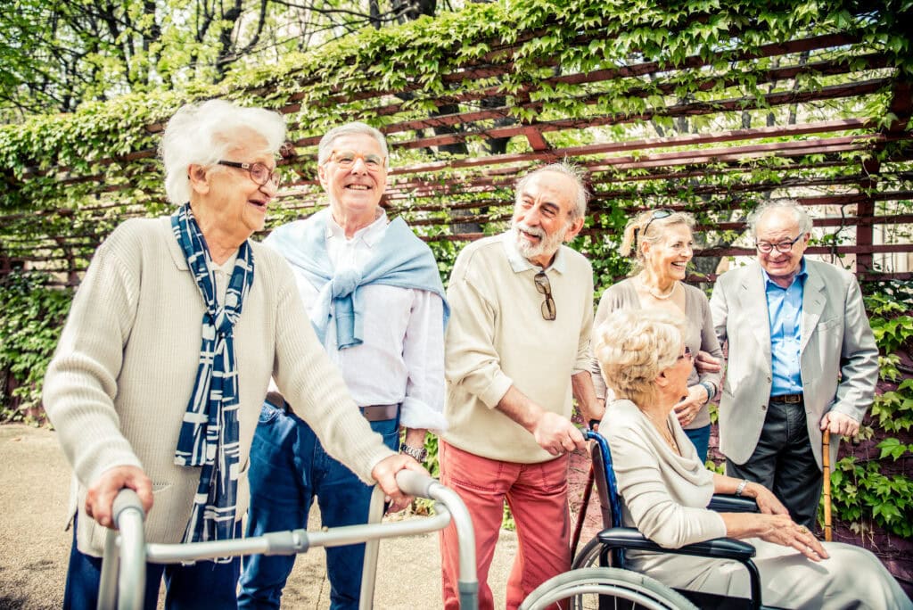Senior people walking outdoors